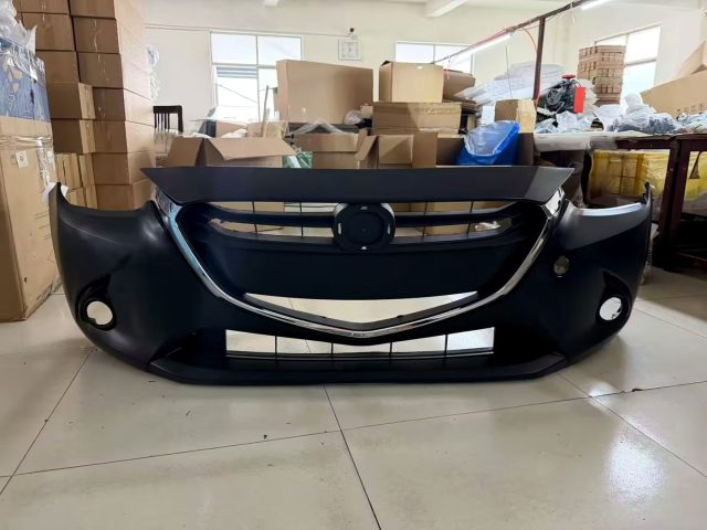 front bumper assembly Mazda Demio