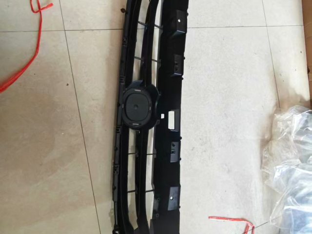 grille Mazda Demio